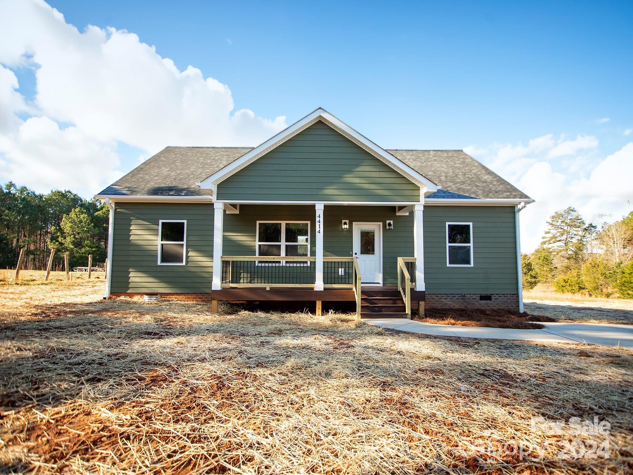 front view of a house with a patio