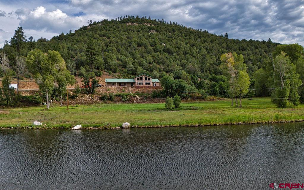 a view of a golf course with a lake