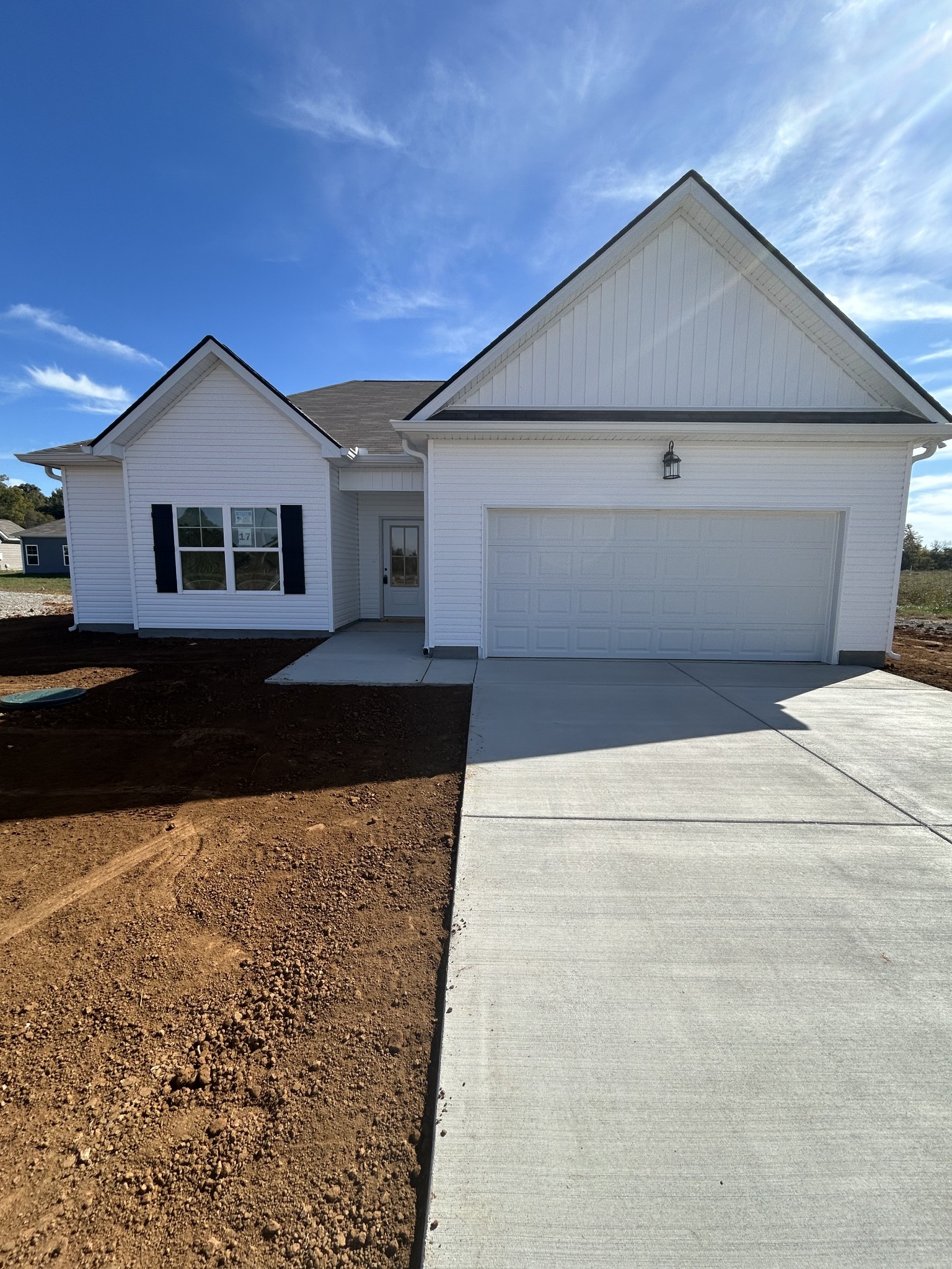 a front view of a house with yard