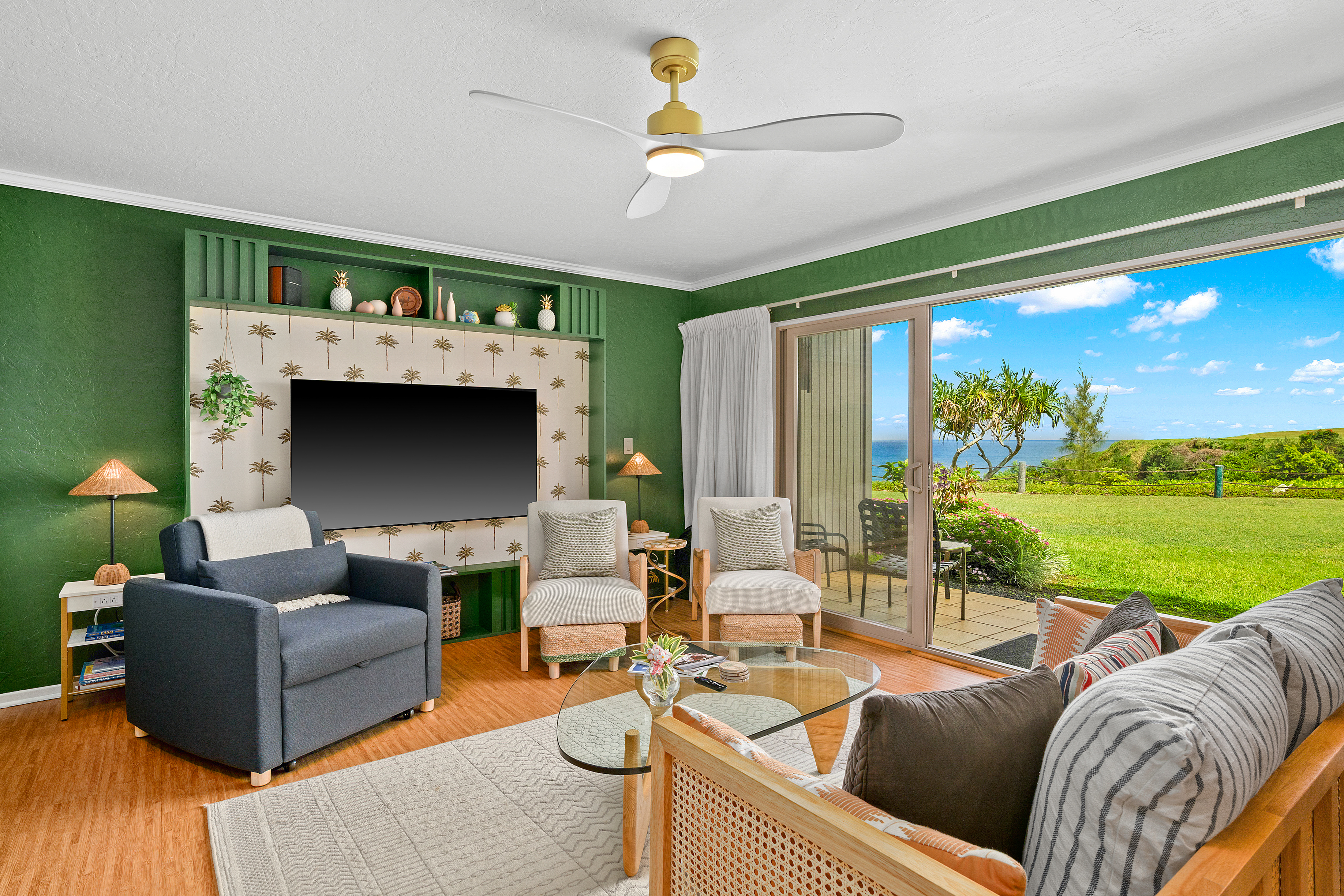 a living room with furniture a floor to ceiling window and a flat screen tv