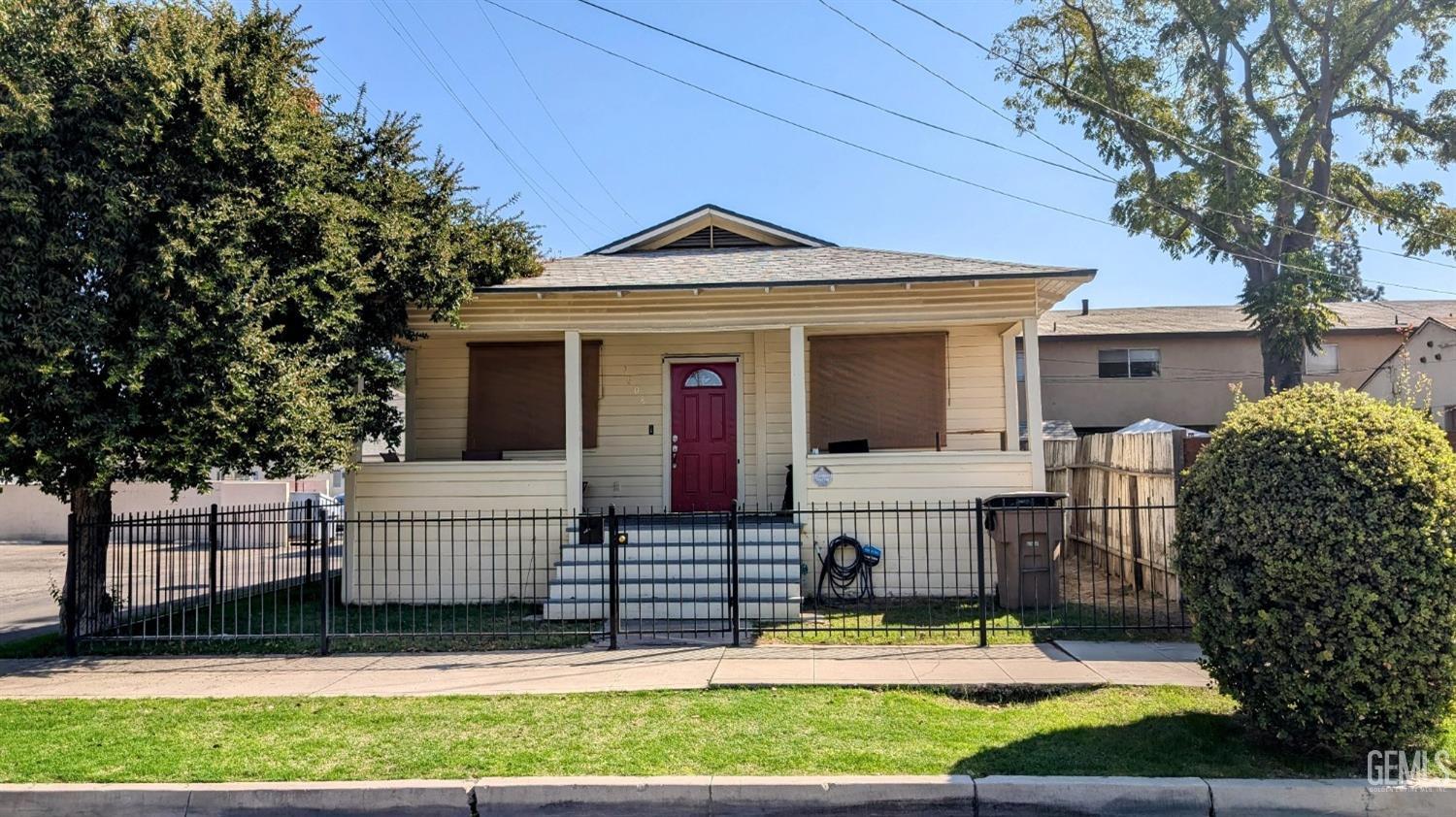 a front view of a house with garage