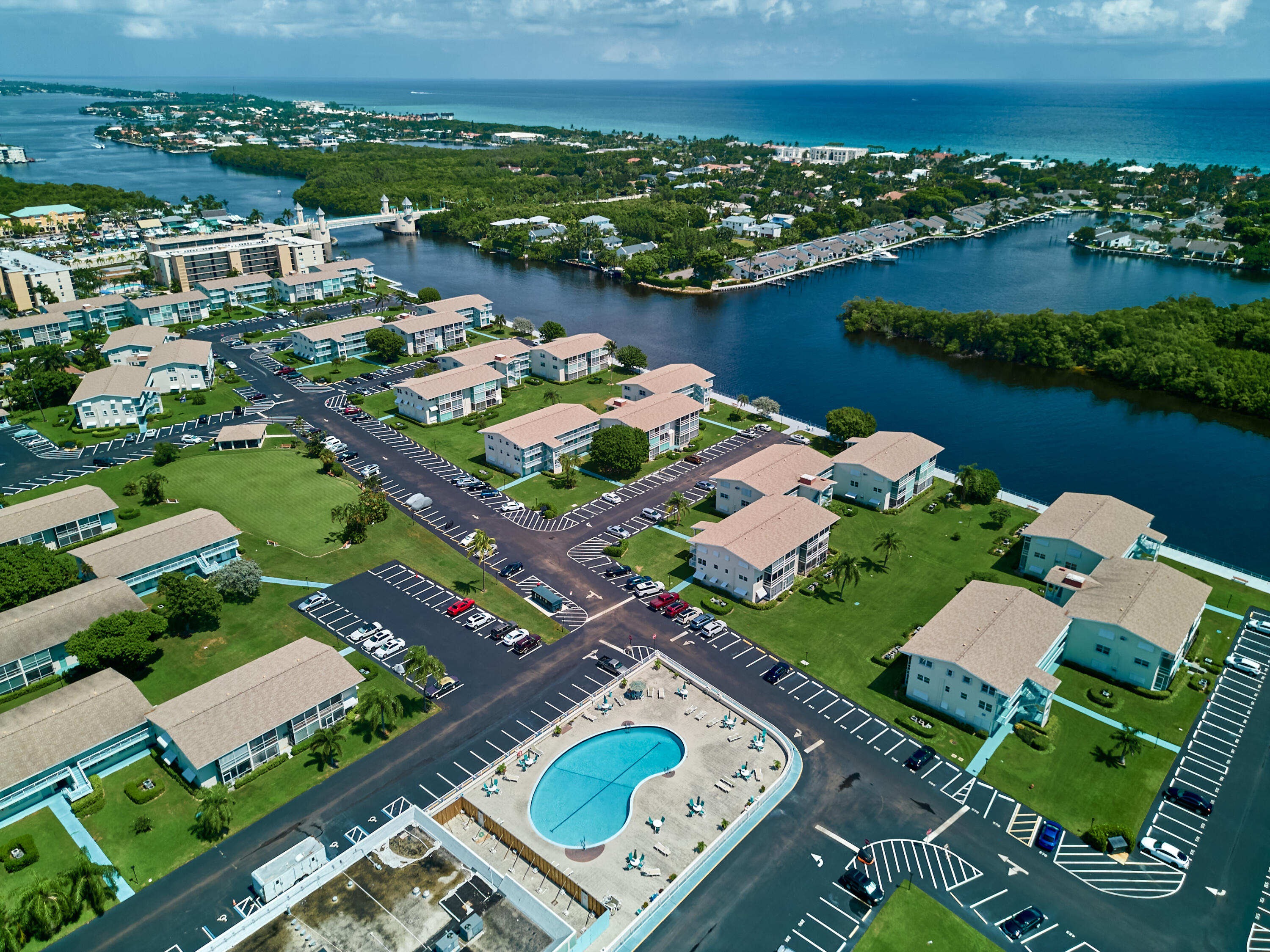 an aerial view of a house with a lake view