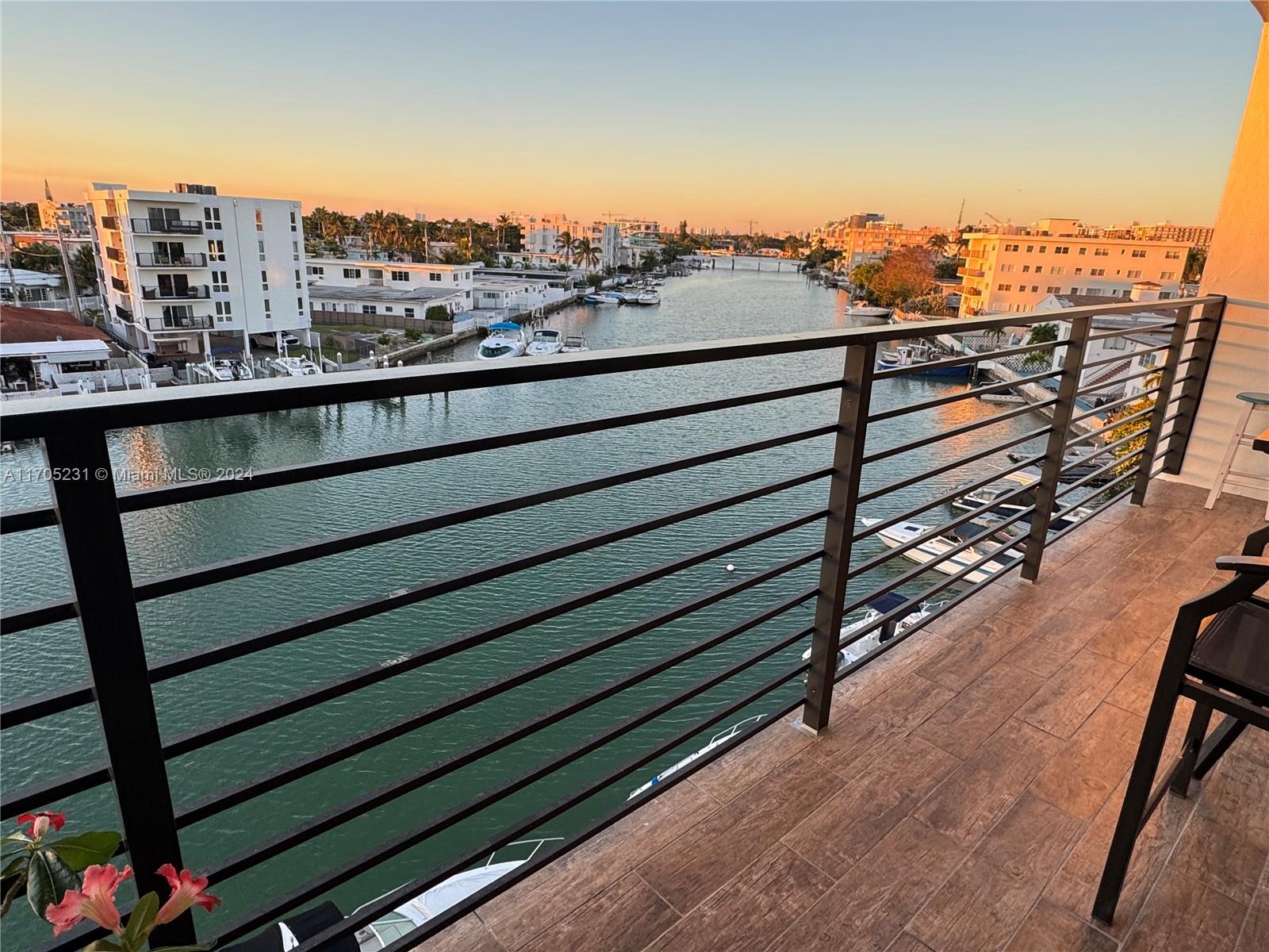 a view of a balcony with city view