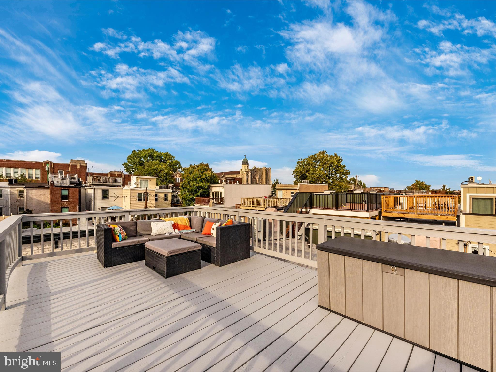 a view of roof deck with patio