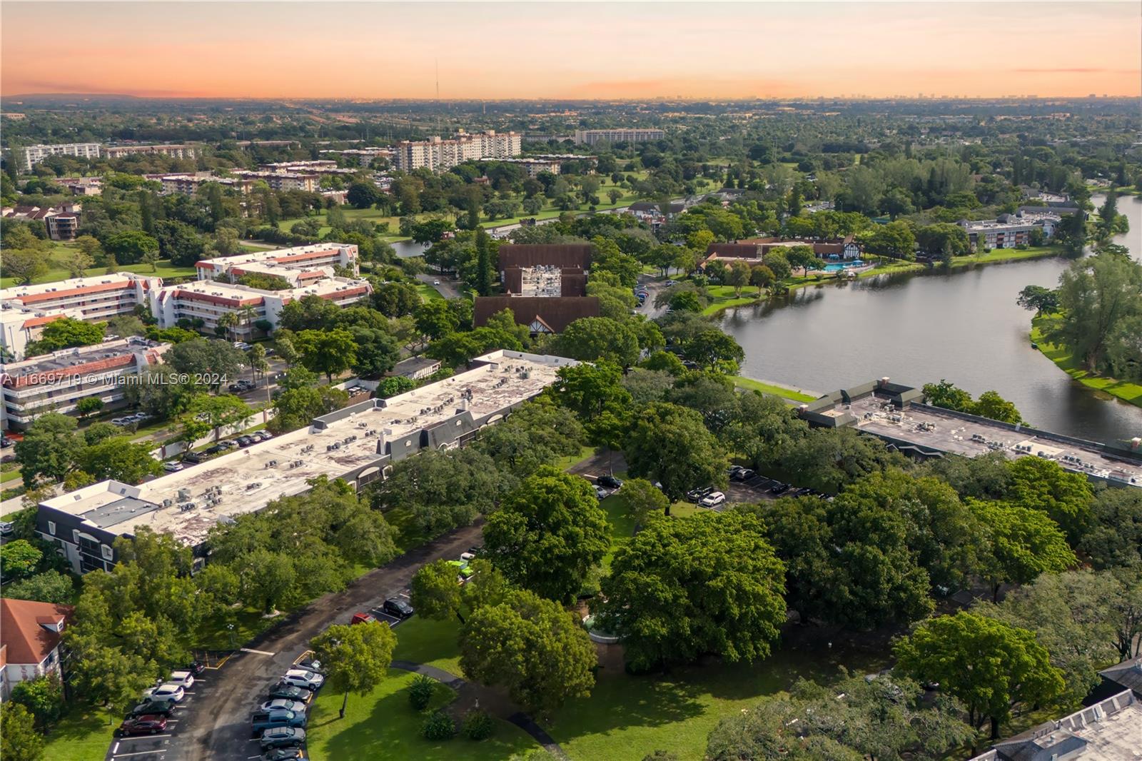 an aerial view of city and lake