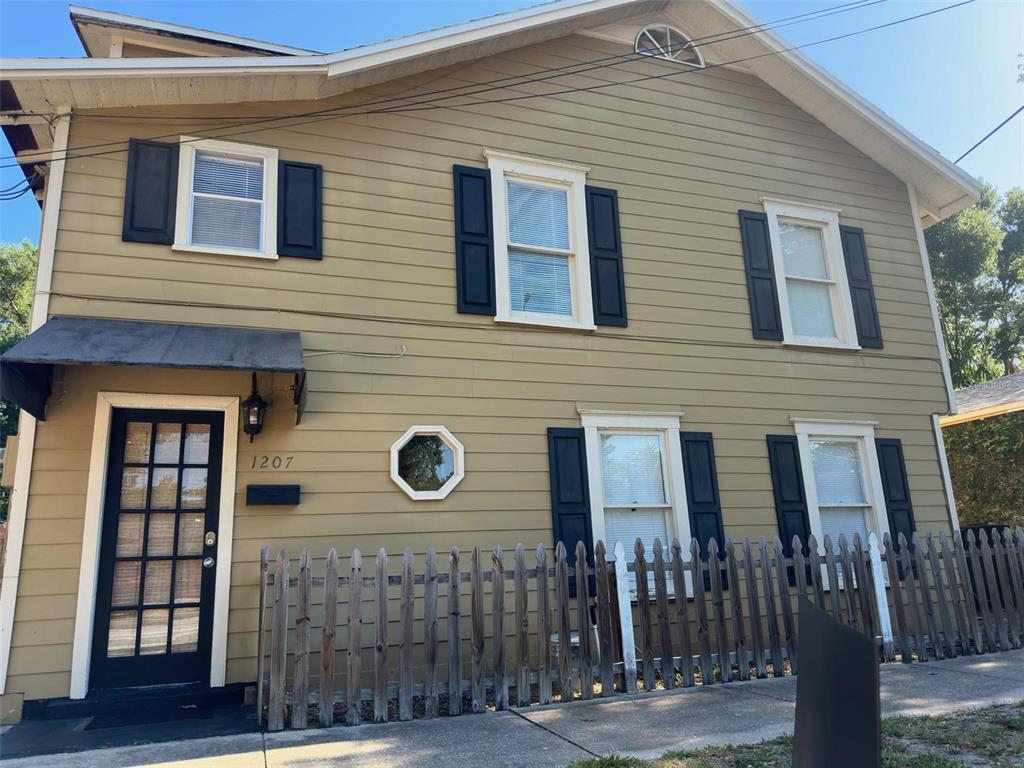 a front view of a house with door