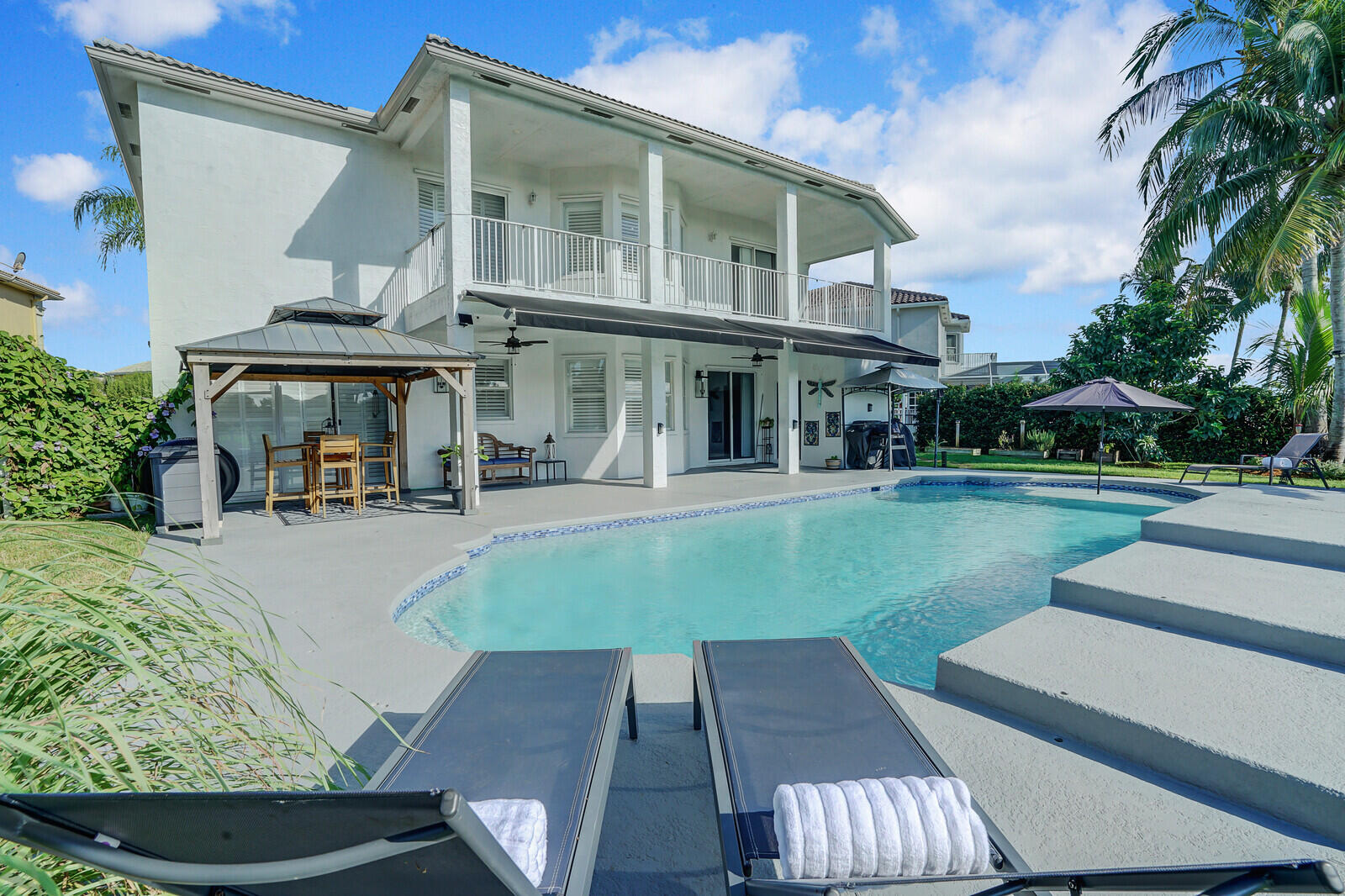 a view of outdoor space yard deck patio and swimming pool