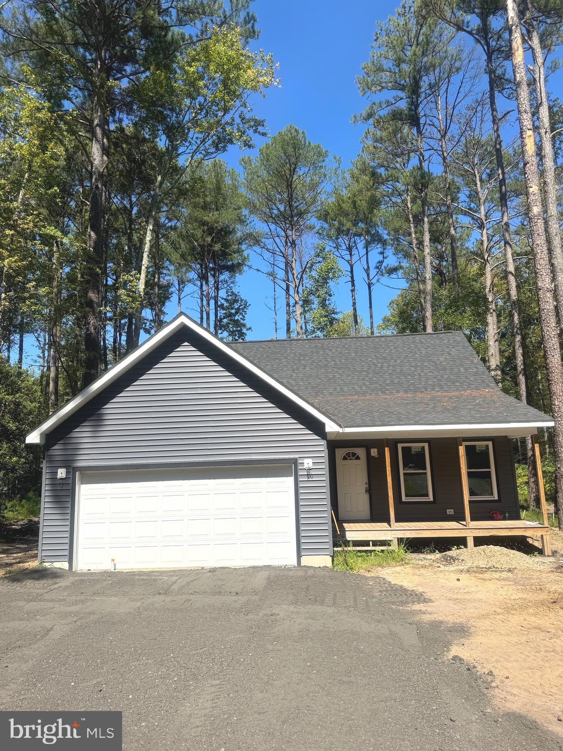 a house with trees in the background