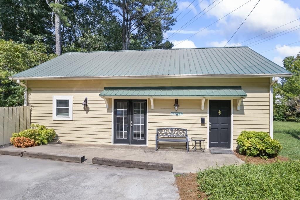 a front view of a house with a garage