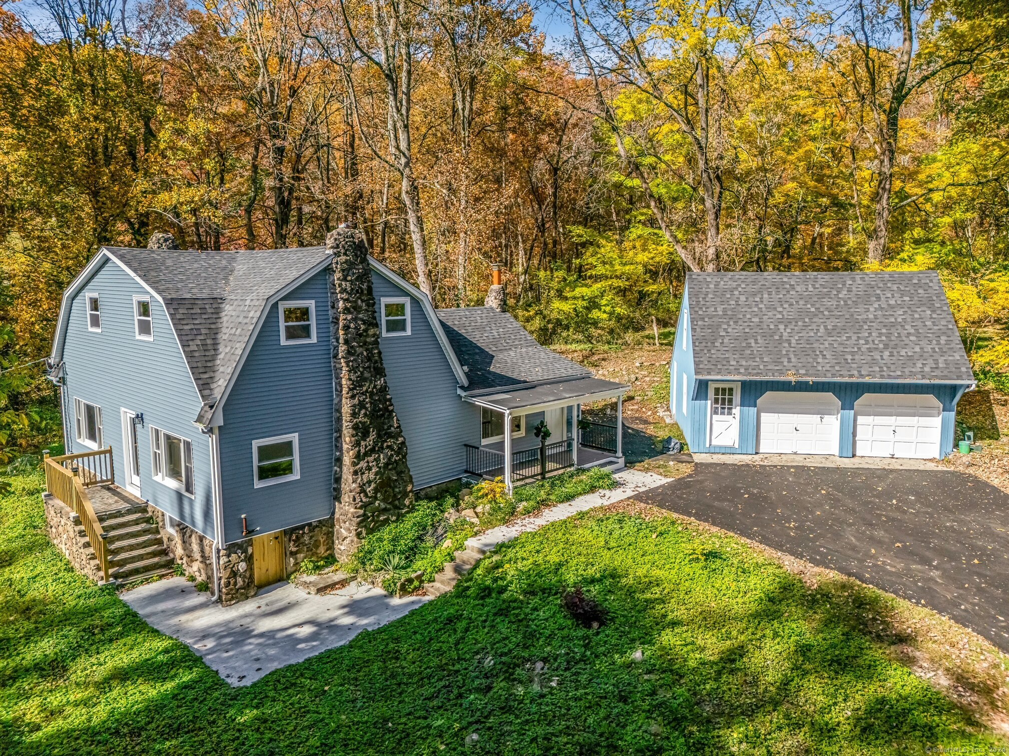 front view of a house with a yard