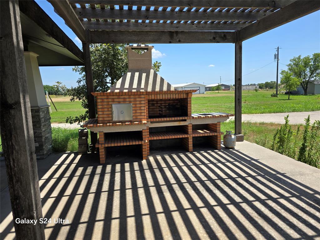 a view of a balcony with wooden floor