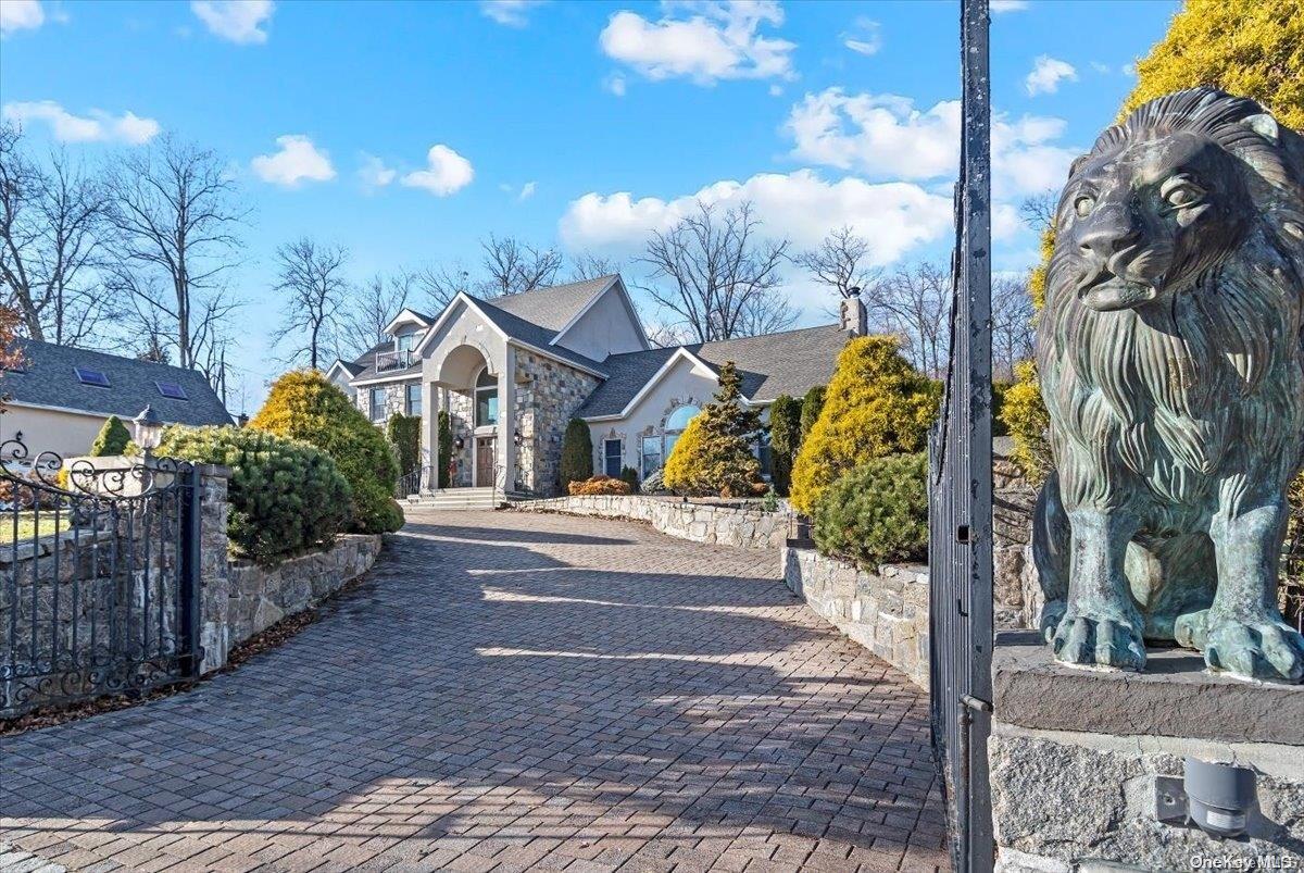 a view of a house with a small yard