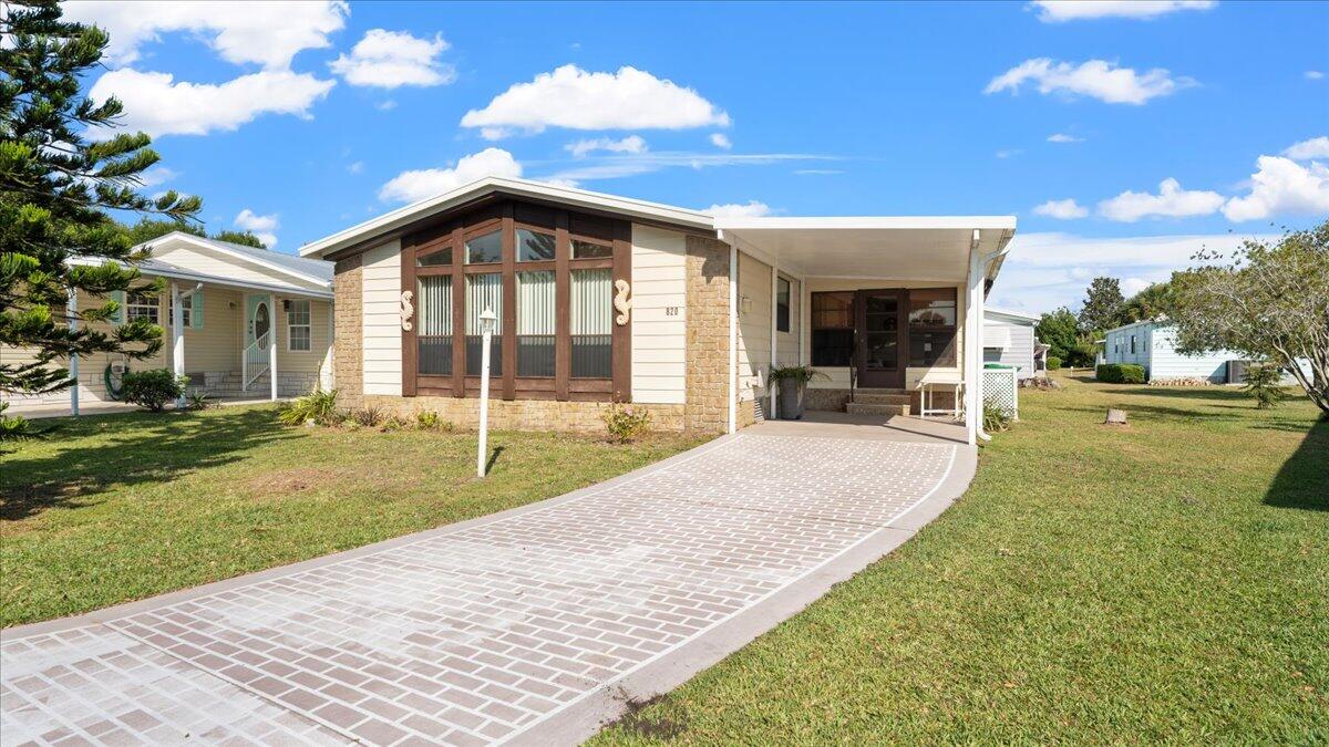 a view of a house with entertaining space