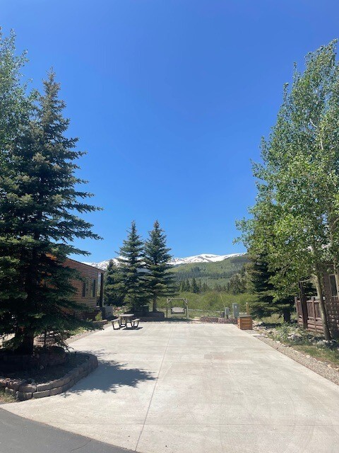 a view of a road with a building in the background