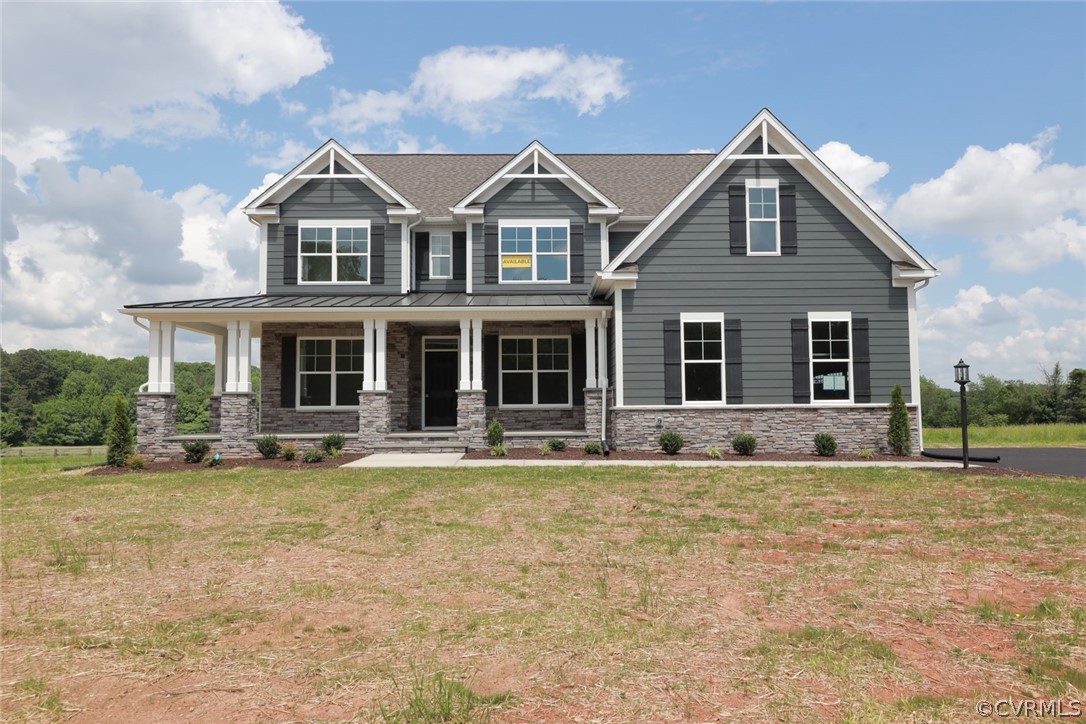 The Charleston features 5 bedrooms, 4 baths sittin