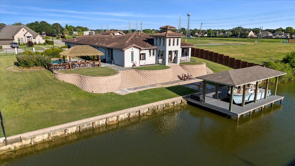 aerial view of a house with a ocean view