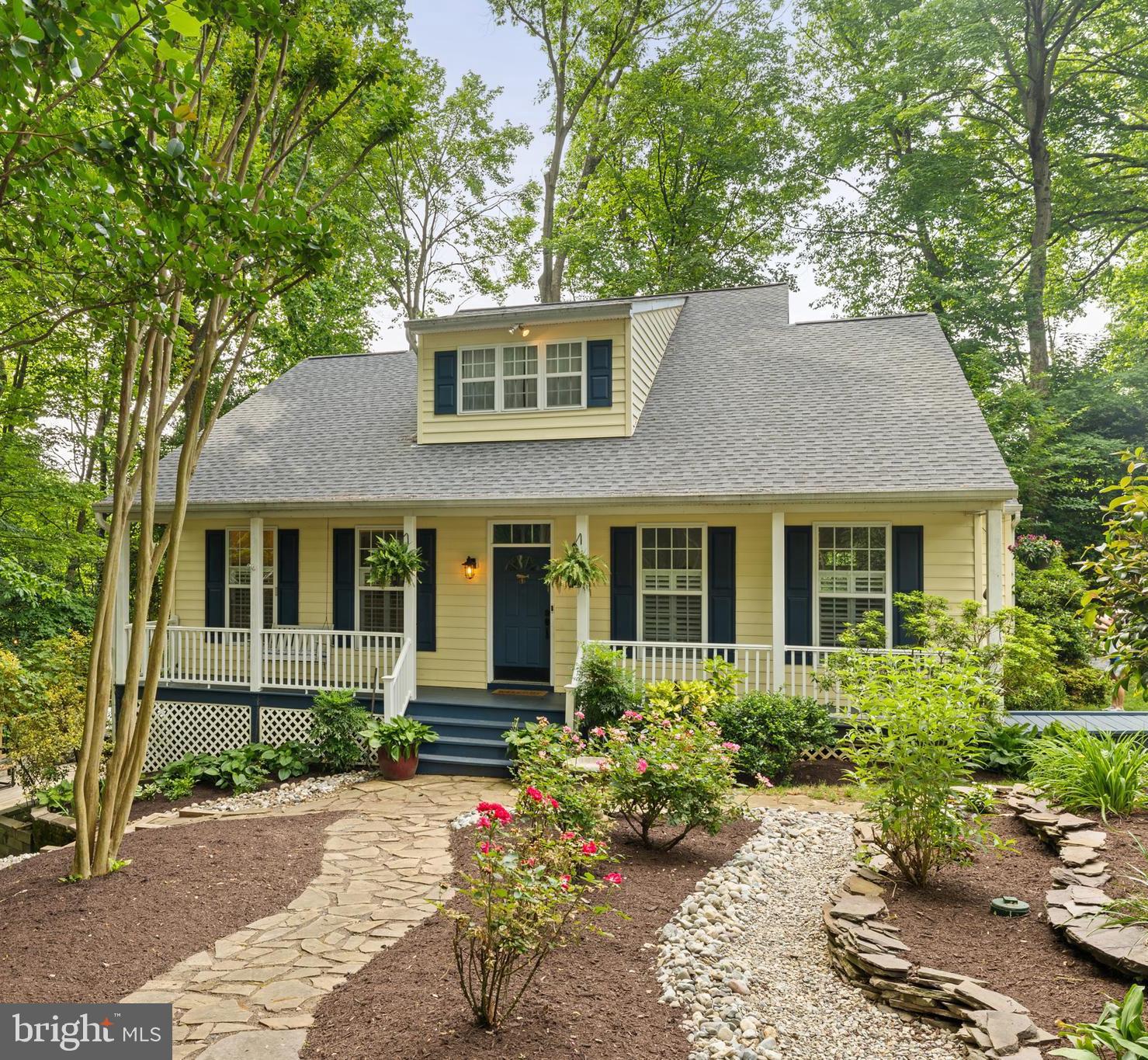 front view of a house with a yard