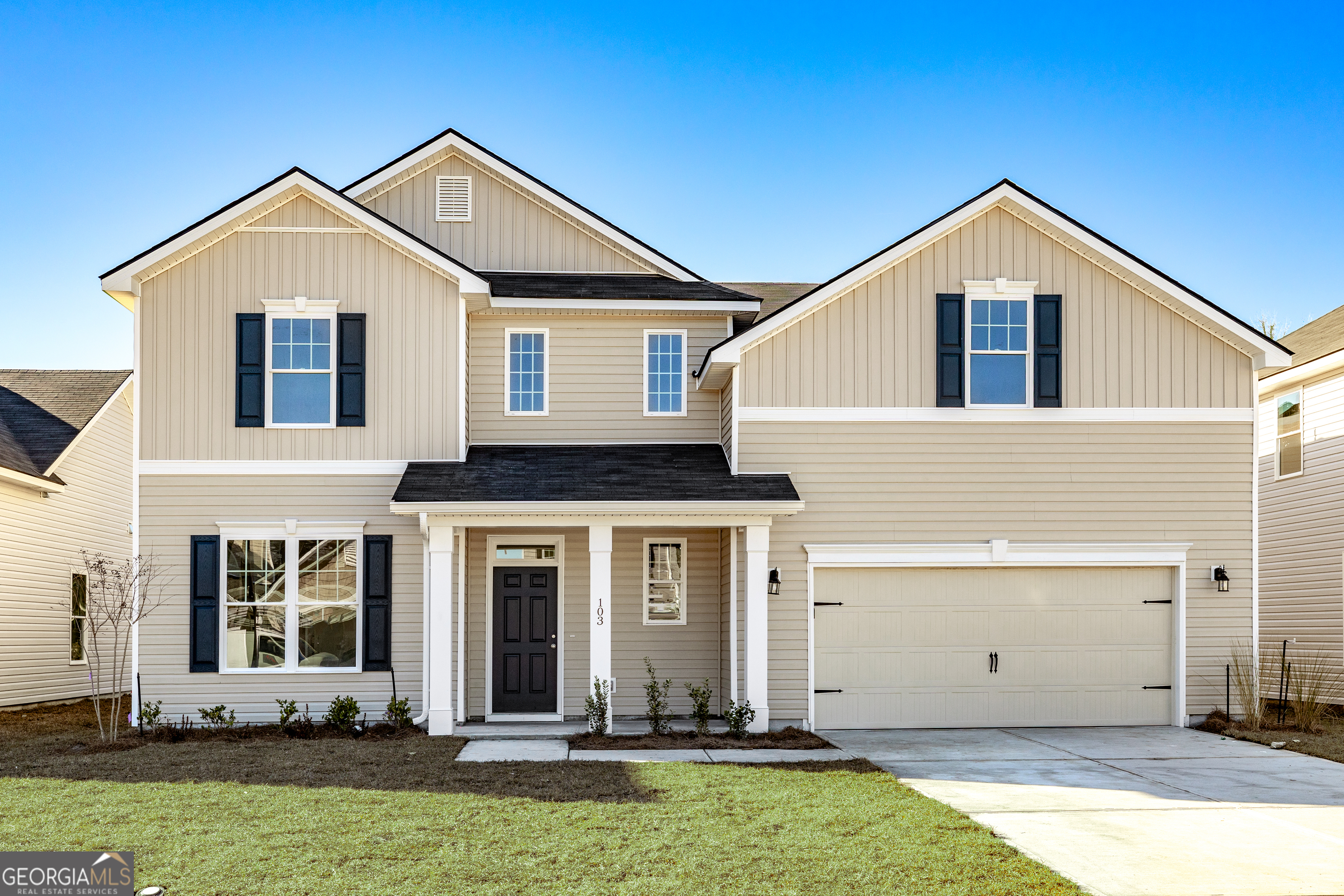 a front view of a house with yard