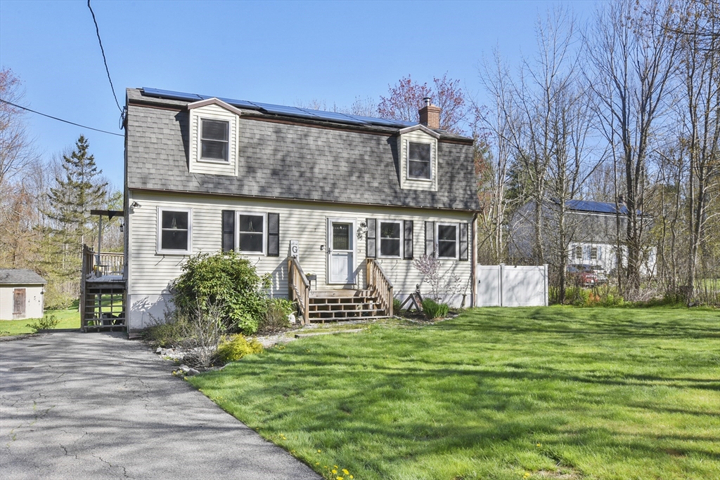 a front view of house with yard