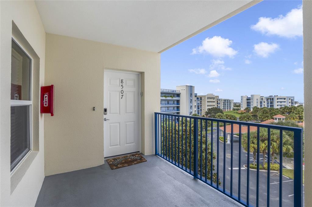 a view of a balcony with city view