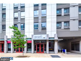 a front view of multi story residential apartment building