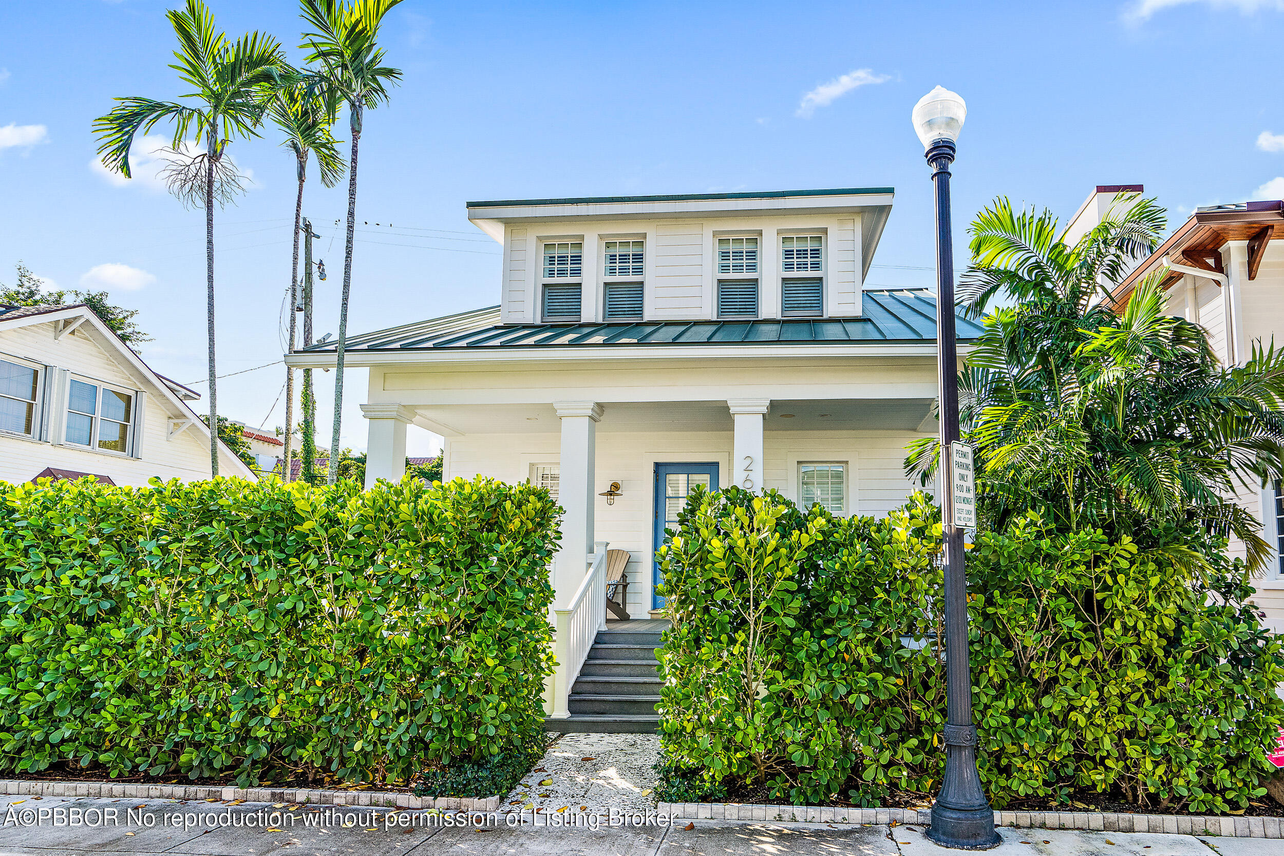 a front view of a house with porch