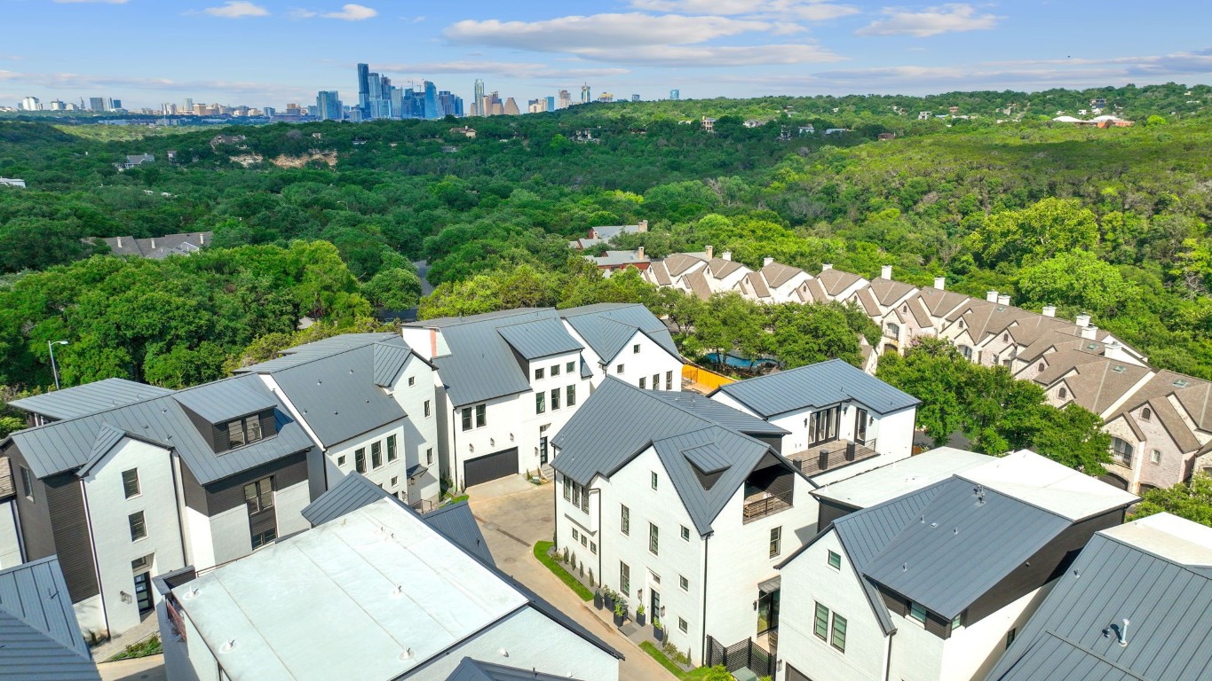 Beautiful Barton Creek surrounds the community