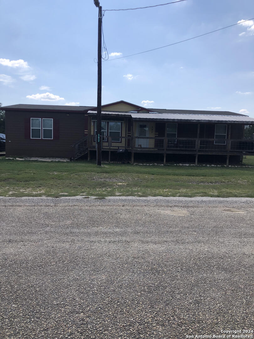 a front view of a house having yard