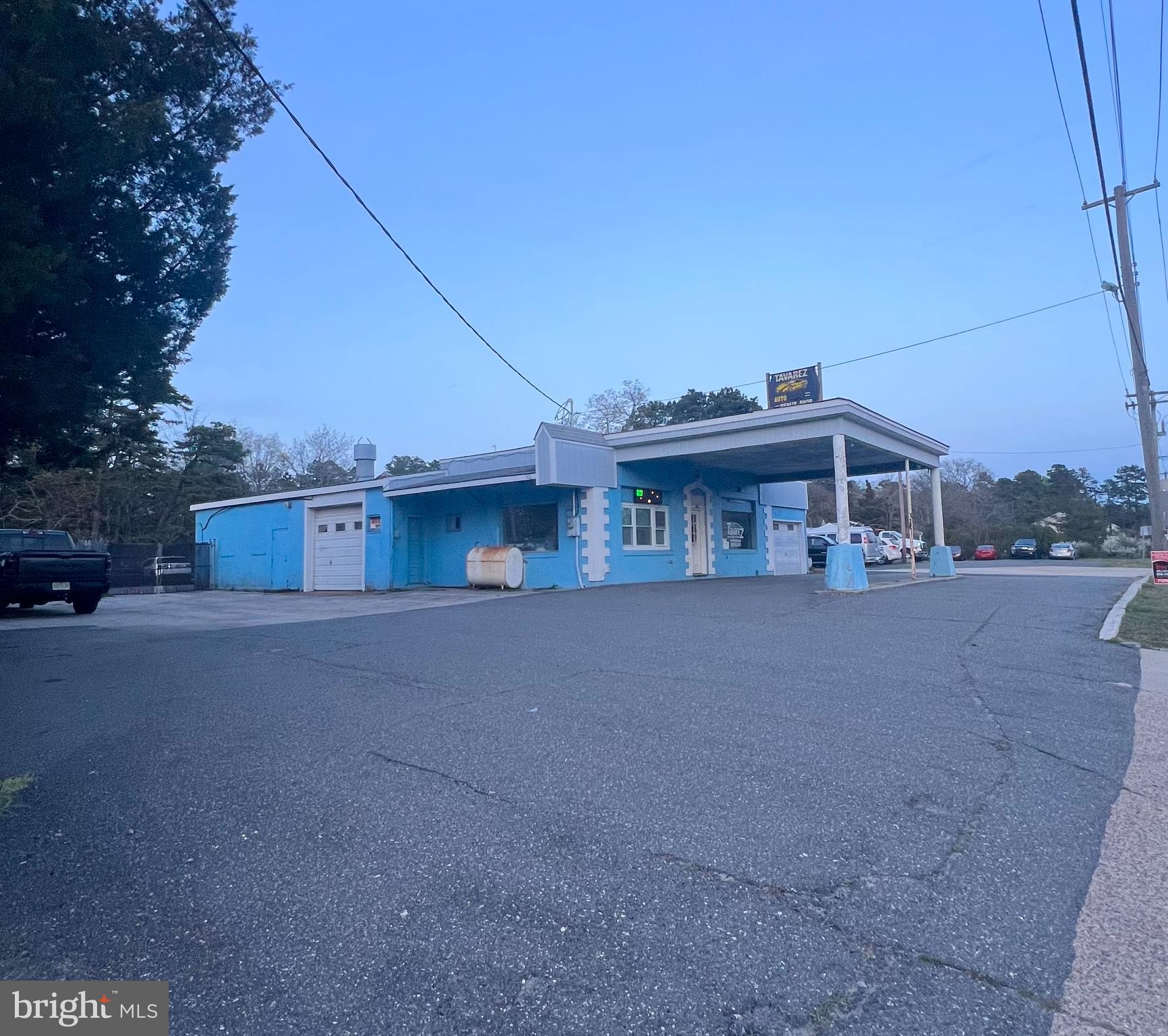 a view of a house next to a yard