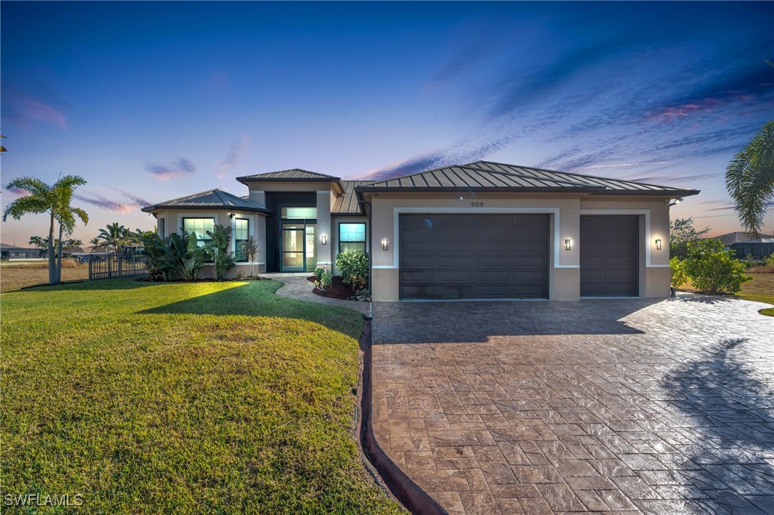 a front view of house with yard and green space