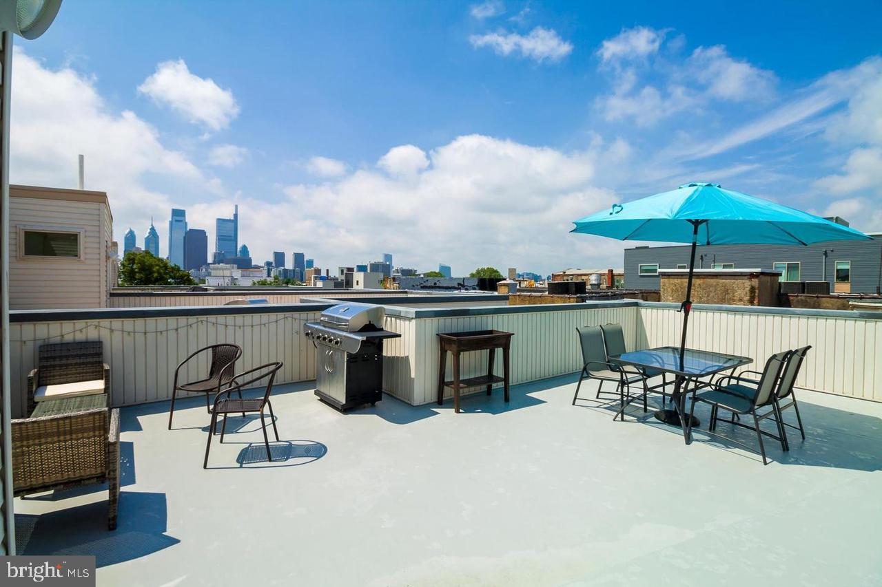 a view of a terrace with furniture