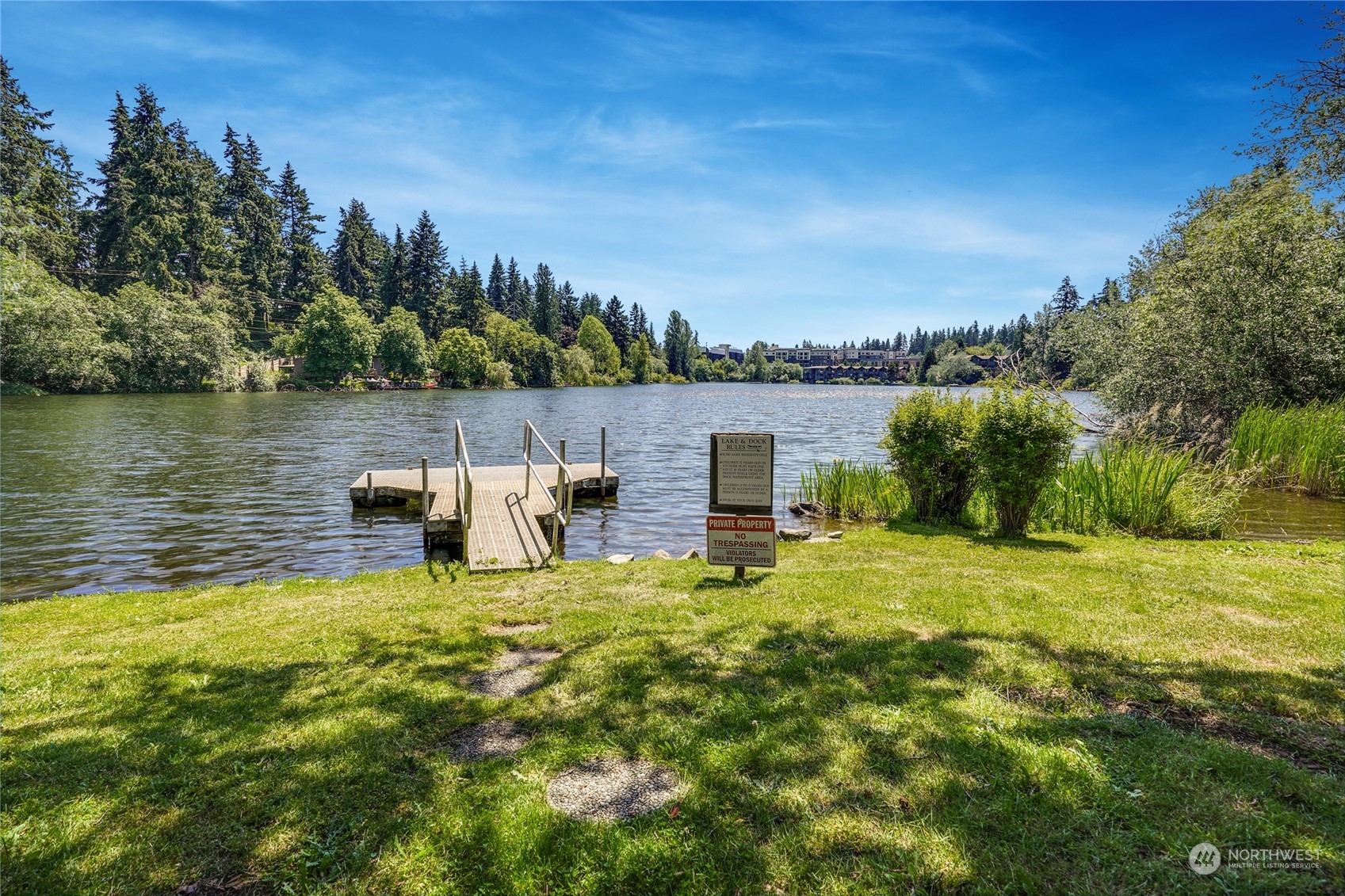 a swimming pool with lake view