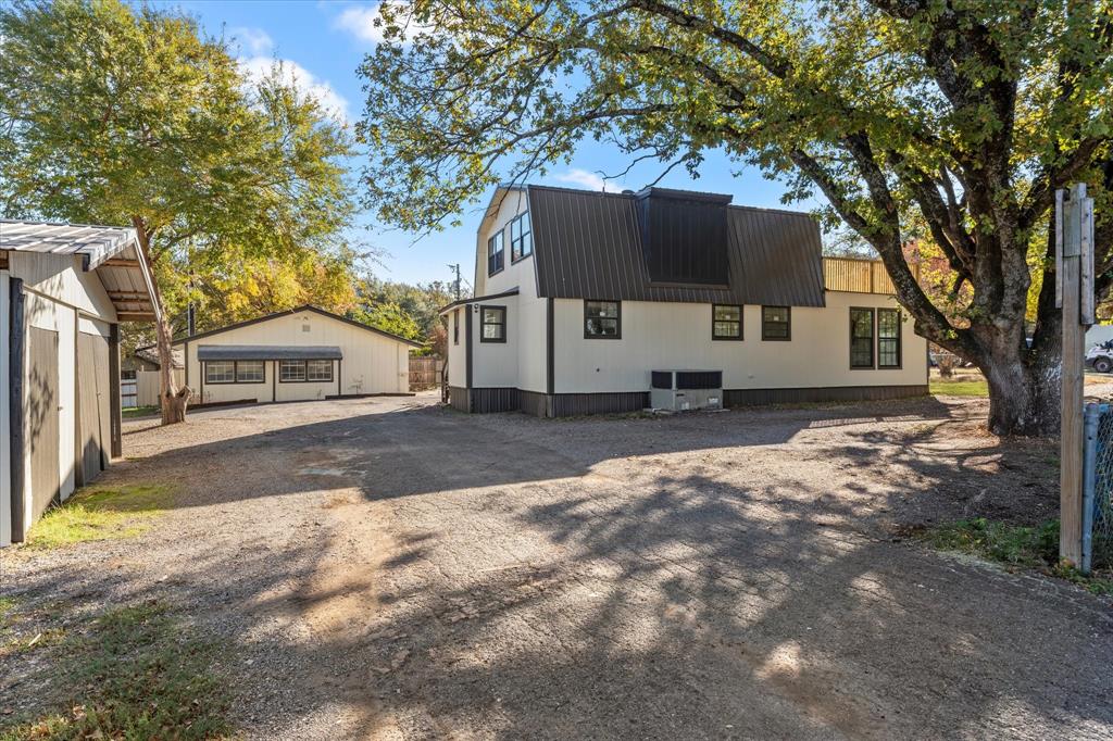 a house with trees in front of it