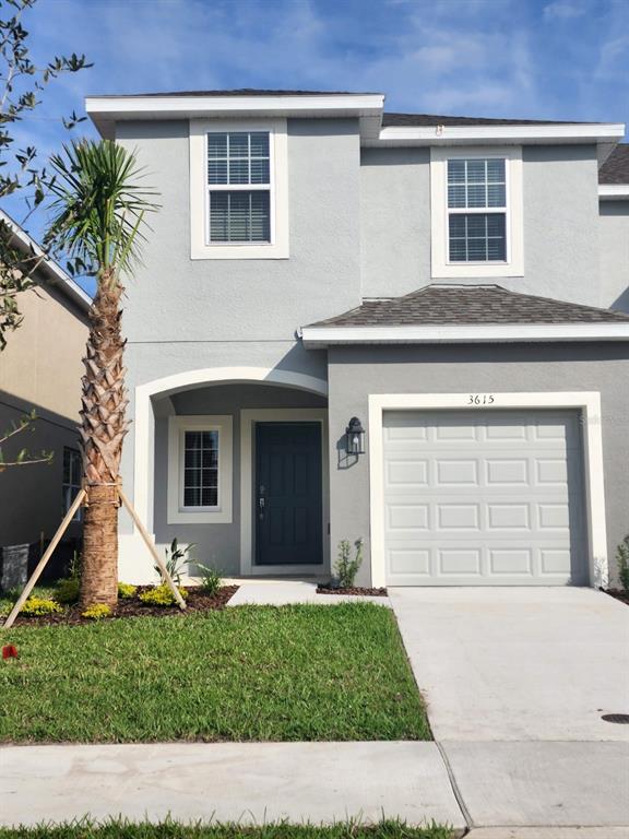 front view of a house and a yard