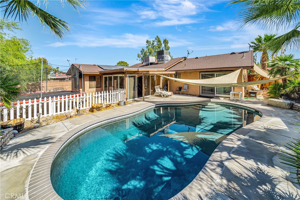 a view of a house with a swimming pool