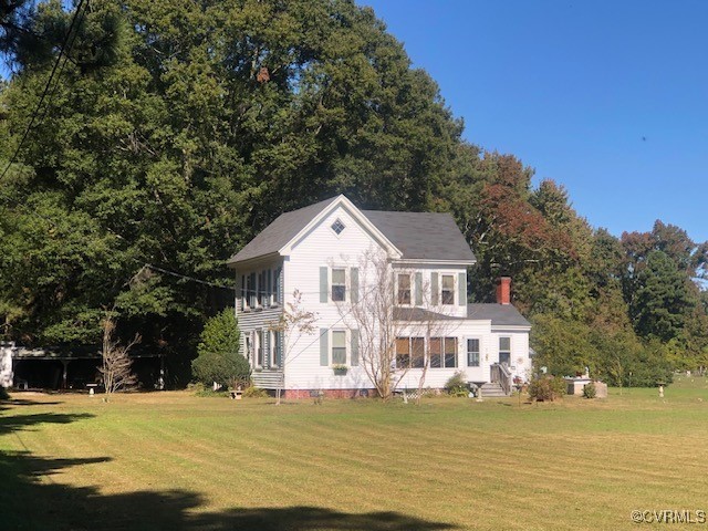 a view of a house with a ocean view