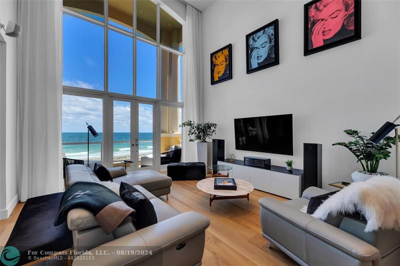 a living room with furniture or couch and a flat screen tv