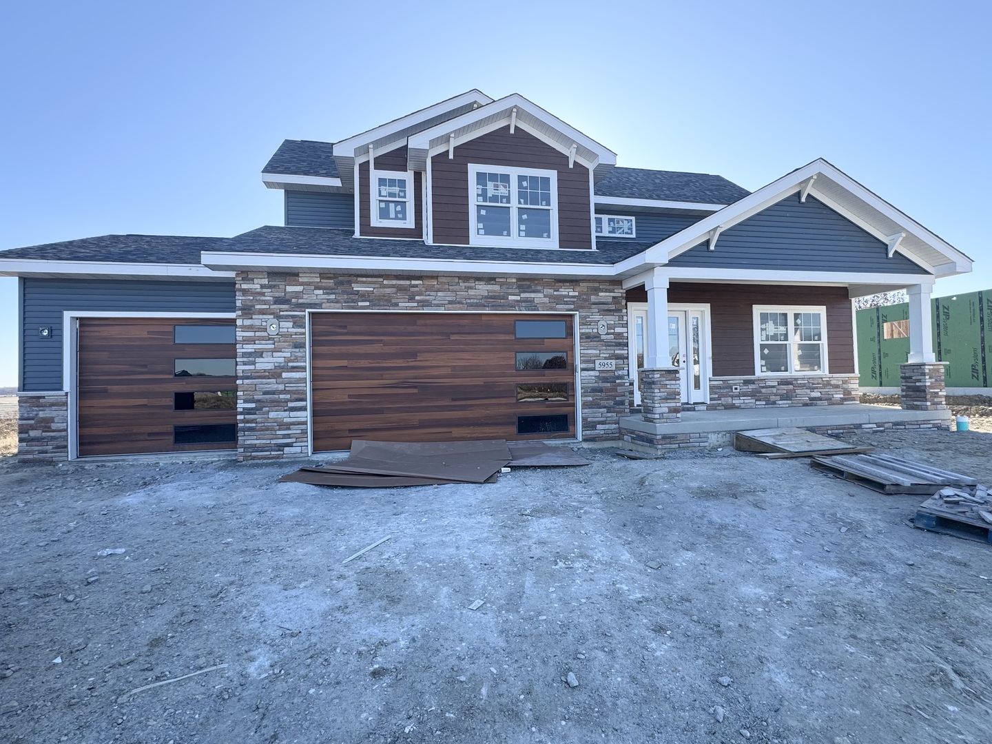 a view of house with backyard space and wooden deck