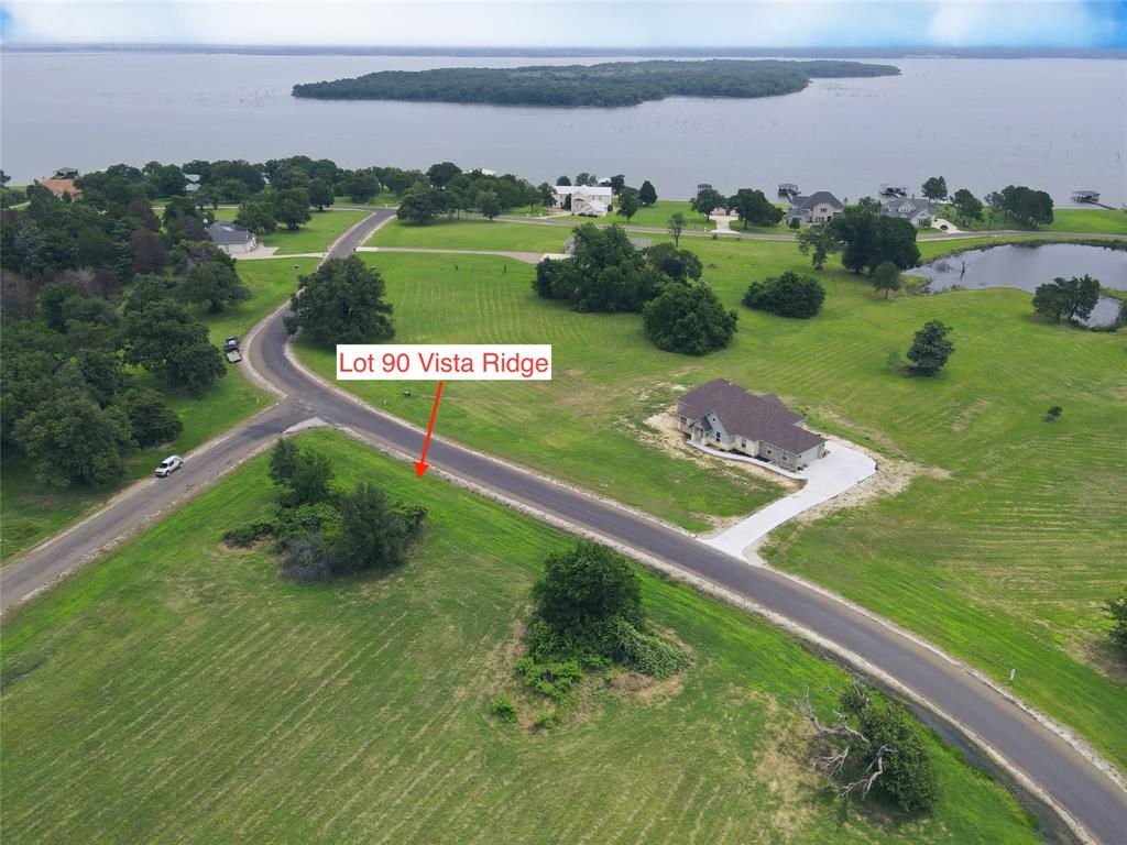 a view of a park with an ocean view