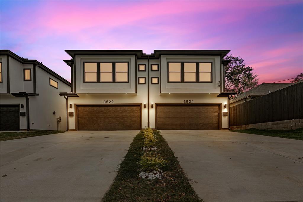 a front view of a house with yard