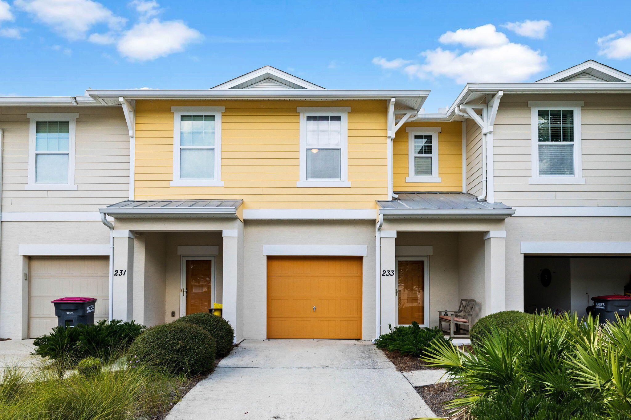 a front view of a house with yard