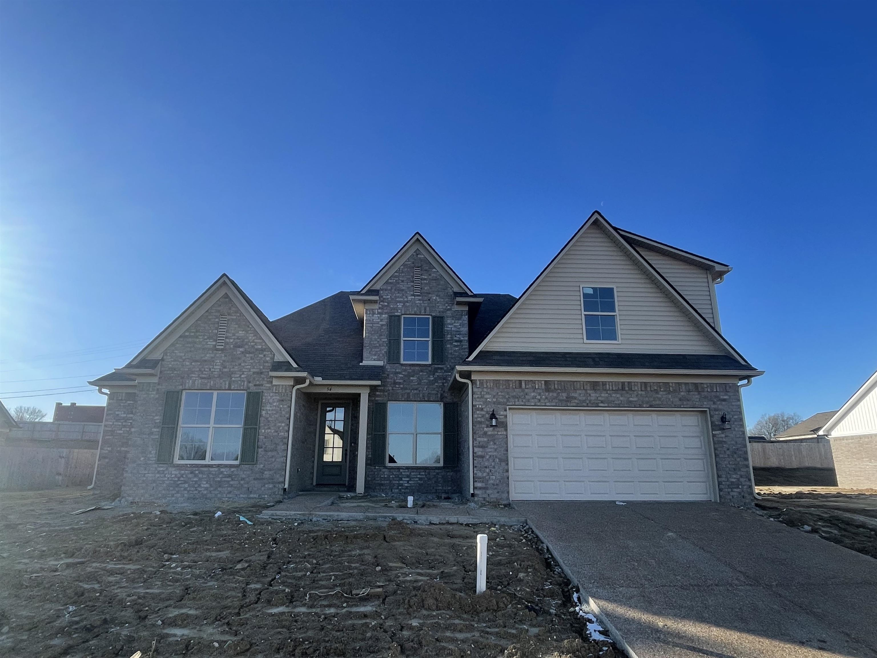 View of front property with a garage