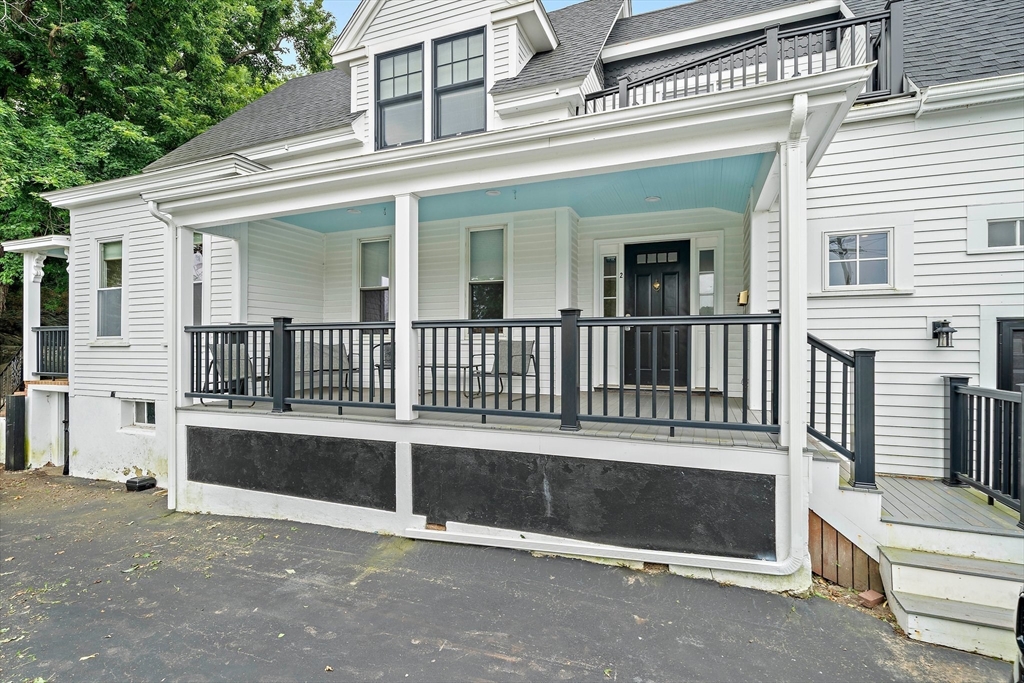 front view of a house with a balcony