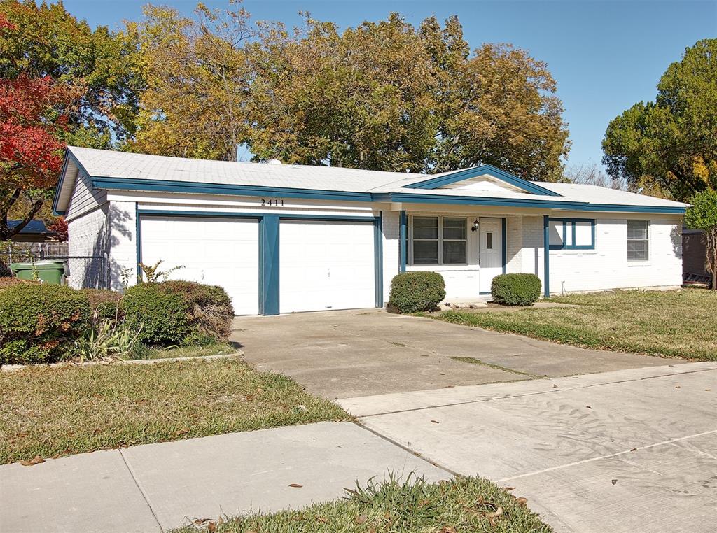 front view of a house and a yard