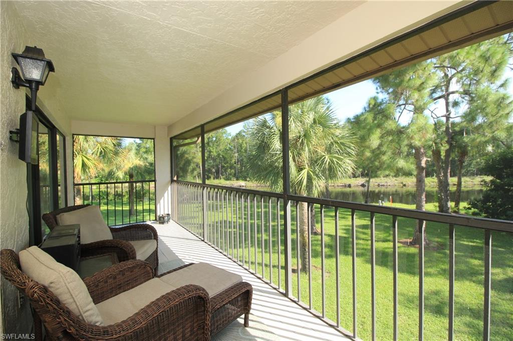 a living room with large windows