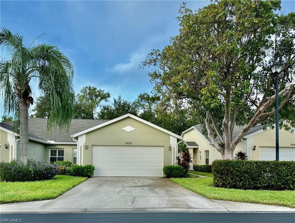 Ranch-style home featuring a garage