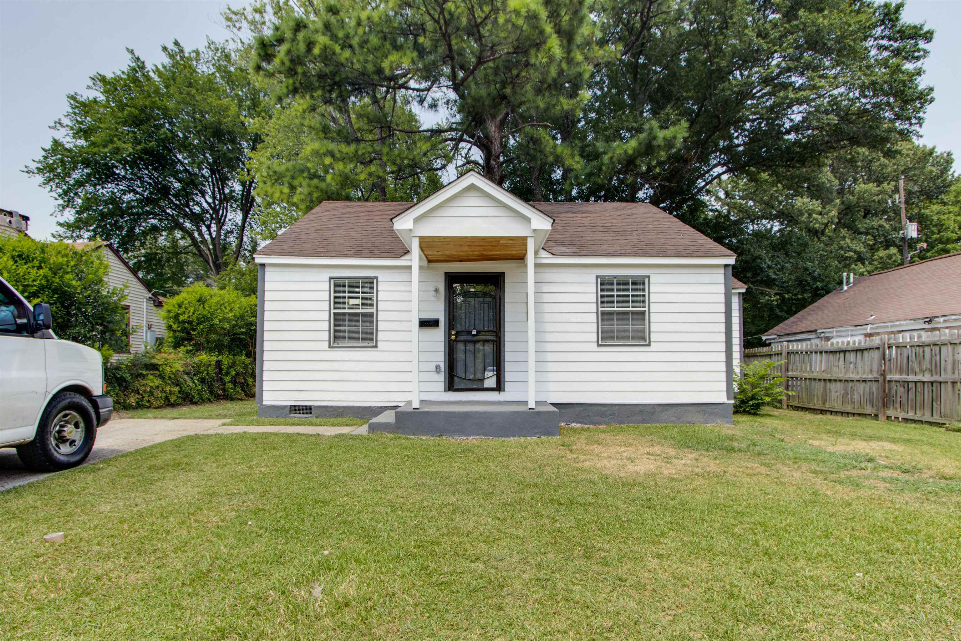 Bungalow-style house featuring a front lawn