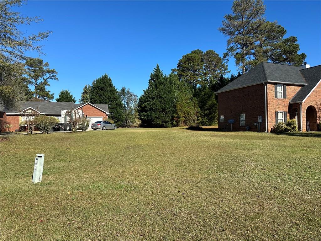 a house view with garden space