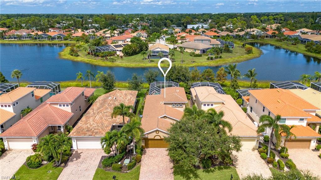 Bird's eye view of home featuring a water view