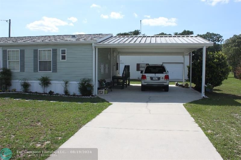 a view of a house with a patio